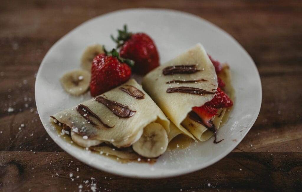 Family-Friendly Restaurants in Paris – Crêpe with Strawberries Family-friendly restaurants in Paris serving crêpes with strawberries